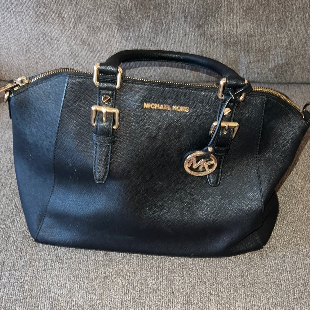 Black and gold Michael Kors handbag